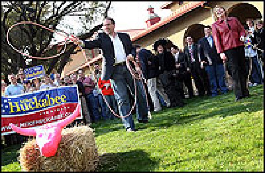 Former Arkansas Gov. Mike Huckabee and his wife Janet visit the Fort Worth Stockyards on Feb. 29.