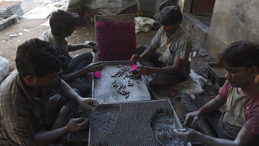 Workers in India prepared firecrackers at a workshop on the outskirts of Ahmedabad last month, ahead of the Diwali festival that peaks on Oct. 19.