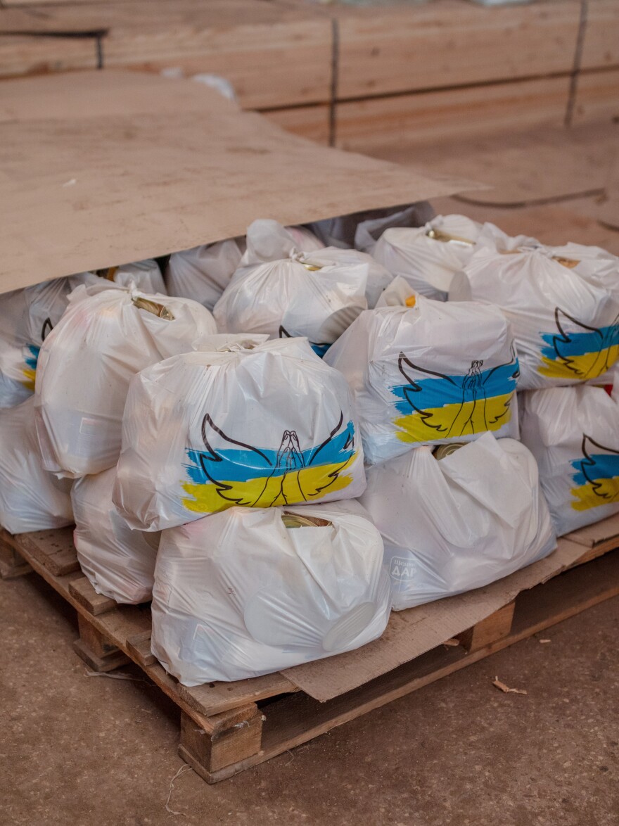 At their warehouse, the Angels of Salvation load Vlad's van with aid for civilians in the neighboring cities around Bakhmut.