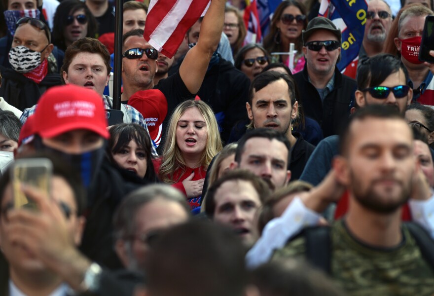 Later in the afternoon, protesters moved to the Supreme Court for a rally, chanting "Four more years!" and "USA!"