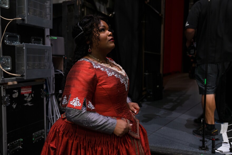 Moore says her job as a soprano is to "sing the character into existence."