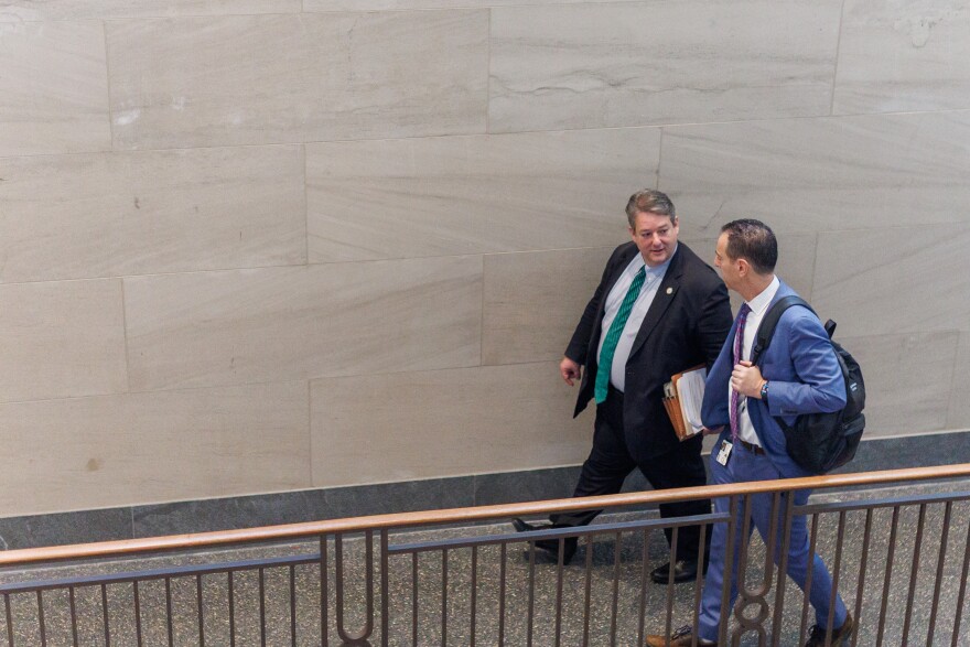 Dels. Alfonso Lopez (left), D–Arlington, and Marcus Simon, D–Fairfax, walk and talk after a press conference on Wednesday, January 28, 2026 in Richmond, Virginia.