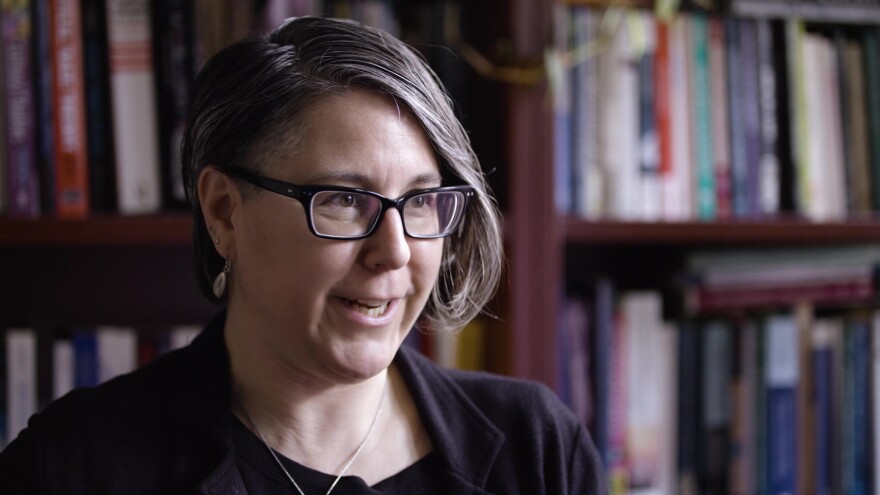 Kim Lewolny being interviewed