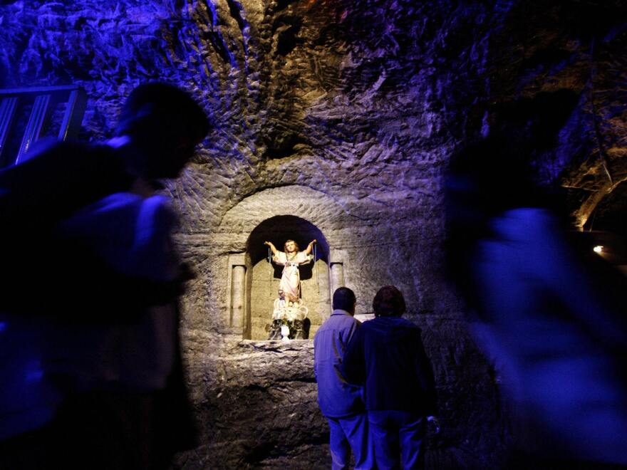 Visitors pass a sculpture inside the Salt Cathedral of Zipaquirá in 2007.