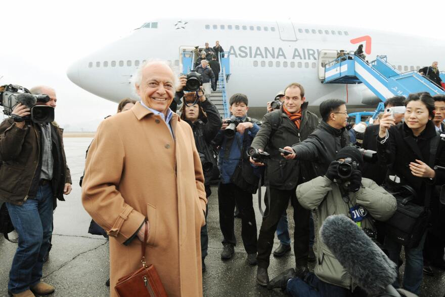 New York Philharmonic Musical Director Lorin Maazel (left) arrives at Pyongyang Airport on Feb. 25, 2008 for the ensemble's inaugural performance in the North Korean capital.