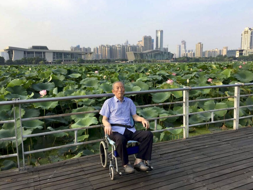 Zhang Lifa, the father of Zhang Hai, in a Wuhan park last year. He spent several years participating in China's nuclear weapons program in the 1960s and suffered life long health consequences from radiation exposure as a result. He died of the coronavirus this year.
