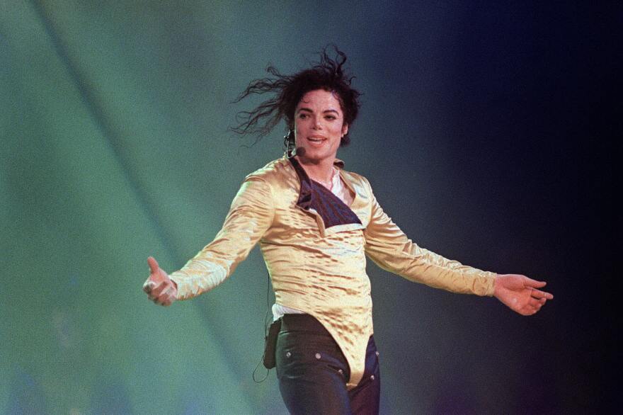 Michael Jackson performs before an estimated audience of 60,000 in Brunei in 1996. Jackson died on June 25, 2009.