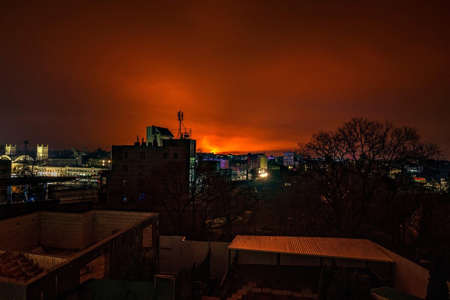<strong>March 30:</strong> Fire and smoke light up the sky east of Kharkiv.