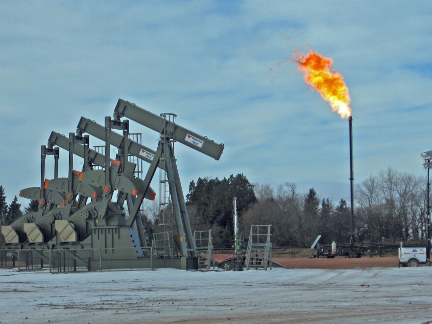 Gas flaring near Keene, N.D. Analysts estimate that almost 30 percent of the gas being produced in the state is burned off.