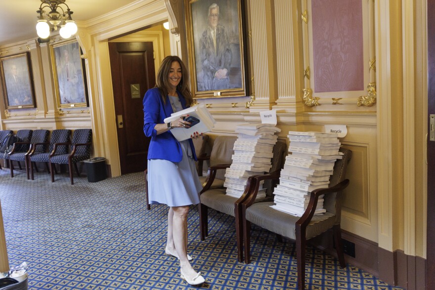 Del. Filler-Corn carries drafts of the budget