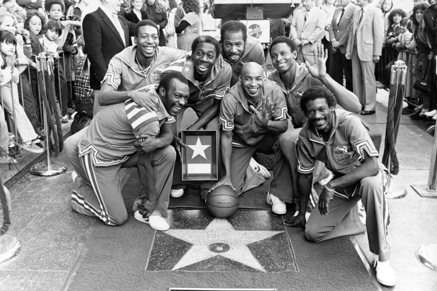 The Harlem Globetrotters are honored with a star in the Hollywood Walk of Fame in Los Angeles, on Jan. 19, 1982. The Globetrotters became the first athletic team to be honored with a star on the sidewalk. From left are, Billy Hobley, Dallas Thornton, Hubert "Geese" Ausbie, Nate Branch, Fred "Curly" Neal, Robert Paige and Larry "Gator" Rivers.