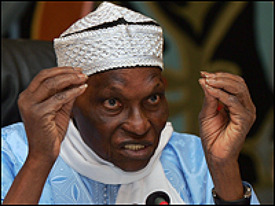 President Abdoulaye Wade speaks with journalists in Dakar ahead of Sunday's elections.