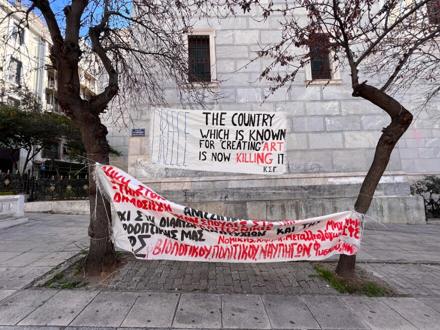 Students and young artists have been occupying the National Theatre of Greece in downtown Athens for more than a month. Banners hang outside, including one that reads: "The country which is known for creating art, is now killing it."