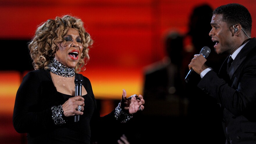 Roberta Flack (left) performs with Maxwell at the Grammy Awards in 2010.