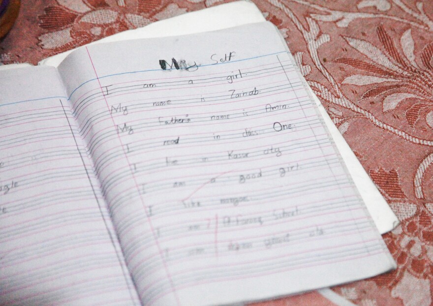 Zainab's last entry in her English class notebook reads, in part: "My name is Zainab ... I live in Kasur city. I am a good girl."