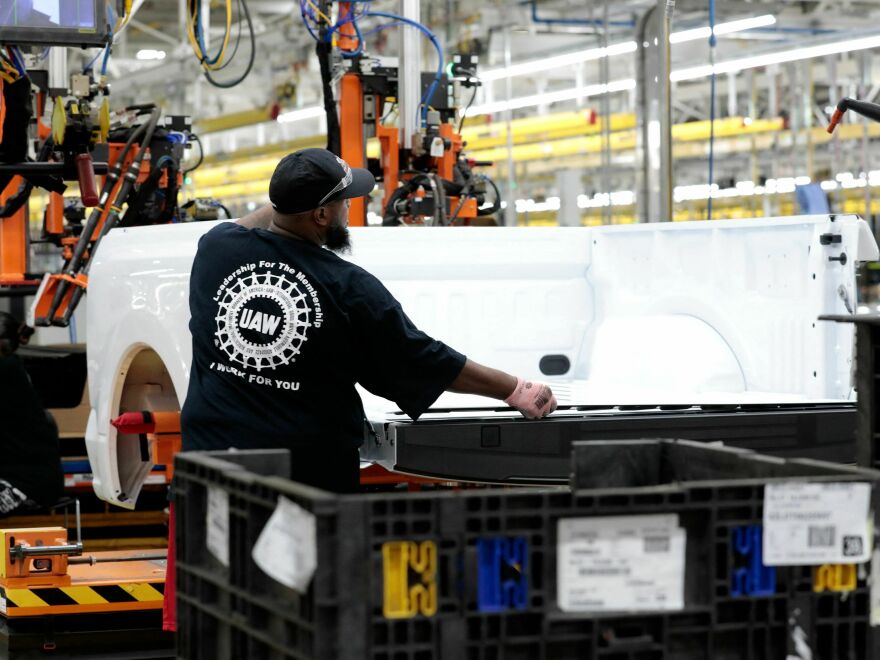 A worker works at Ford's Rouge Electric Vehicle Center in Dearborn, Michigan on Sept. 20, 2022. The higher labor costs will hurt the Big Three's competitiveness but one analyst said it won't be a "death knell."