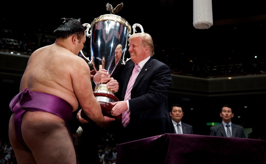 PHOTOS: From Sumo Wrestling To Grand Parades, How World Leaders Try To Impress Trump