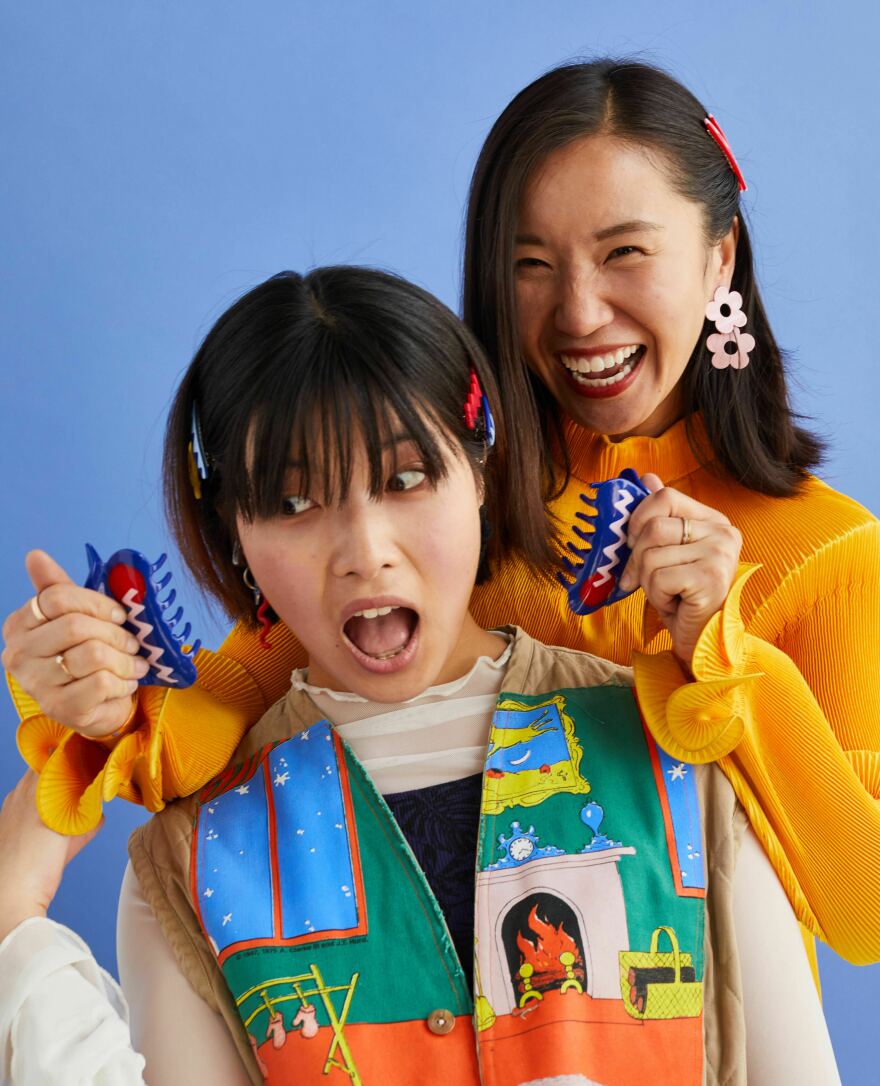 Moy Zhong and Wanyu Zhang showcasing our collaborative product in a captivating photoshoot.