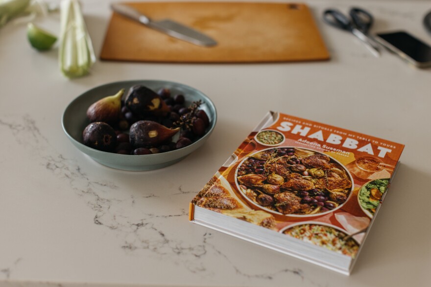 Adeena Sussman's cookbook, <em>Shabbat</em>, on her kitchen counter in Tel Aviv, Israel.