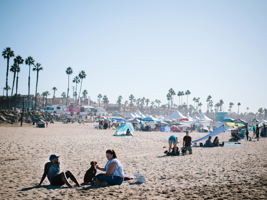 NPR's Sam Sanders helps Chloe Schofield, a busy special education teacher, transform her weekend into a relaxing mini-vacation at Huntington Dog Beach in Huntington Beach, Calif.